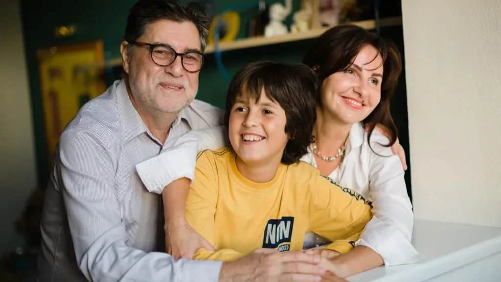 Sergey Zuev with his youngest son Gleb and his wife Elizaveta. Photo from the family archive