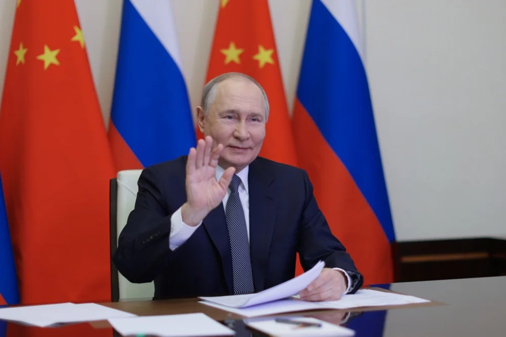 Vladimir Putin greets Xi Jinping during a video call, 21 January 2025. Photo: EPA-EFE / GAVRIIL GRIGOROV / SPUTNIK / KREMLIN POOL