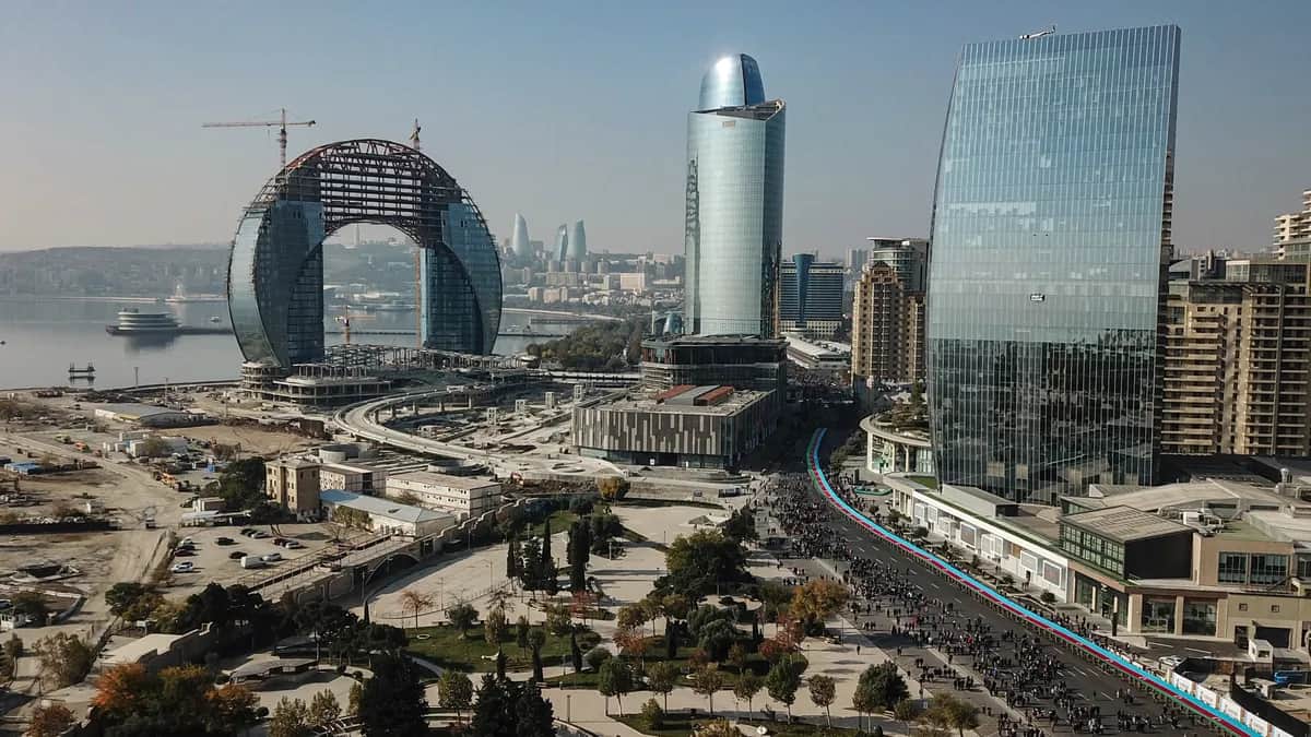 Soldiers in Baku, Azerbaijan, carry a large-scale national flag to mark the end of the 2020 Nagorno-Karabakh War, 8 November 2021. Photo: EPA-EFE / ROMAN ISMAYILOV