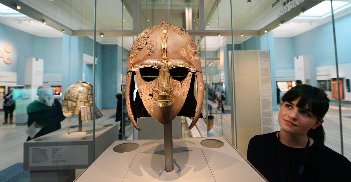 The Sutton Hoo helmet on display at the British Museum in London, 25 March 2014. Discovered in Suffolk in 1939, the magnificent golden helmet was buried with a 7th-century Anglo-Saxon king. Photo: EPA / Andy Rain